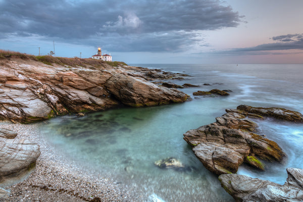 View of Beavertail Lighthouse on Cloudy Evening in Beavertail State Park Rhode Island