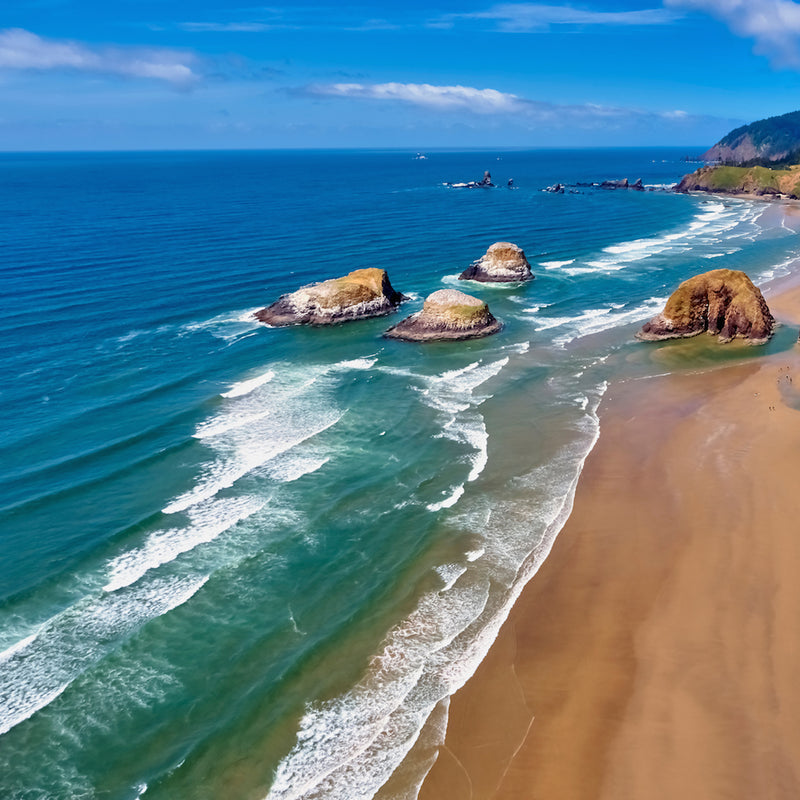 Aerial panorama view of Cannon Beach looking towards Ecola State Park on Oregon coast