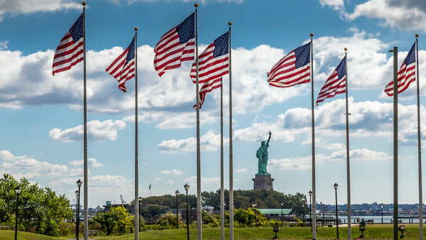 American Flags Statue of Liberty on Sunny Day in Liberty State Park New Jersey