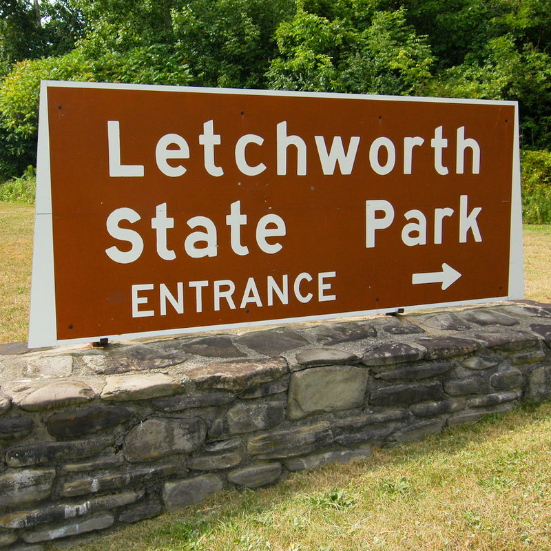 Letchworth State Park entrance sign on sunny day