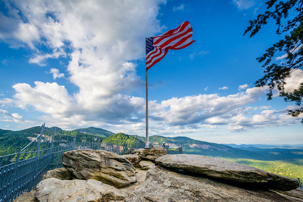 View of American Flag on Top of Chimney Rock at Chimney Rock State Park